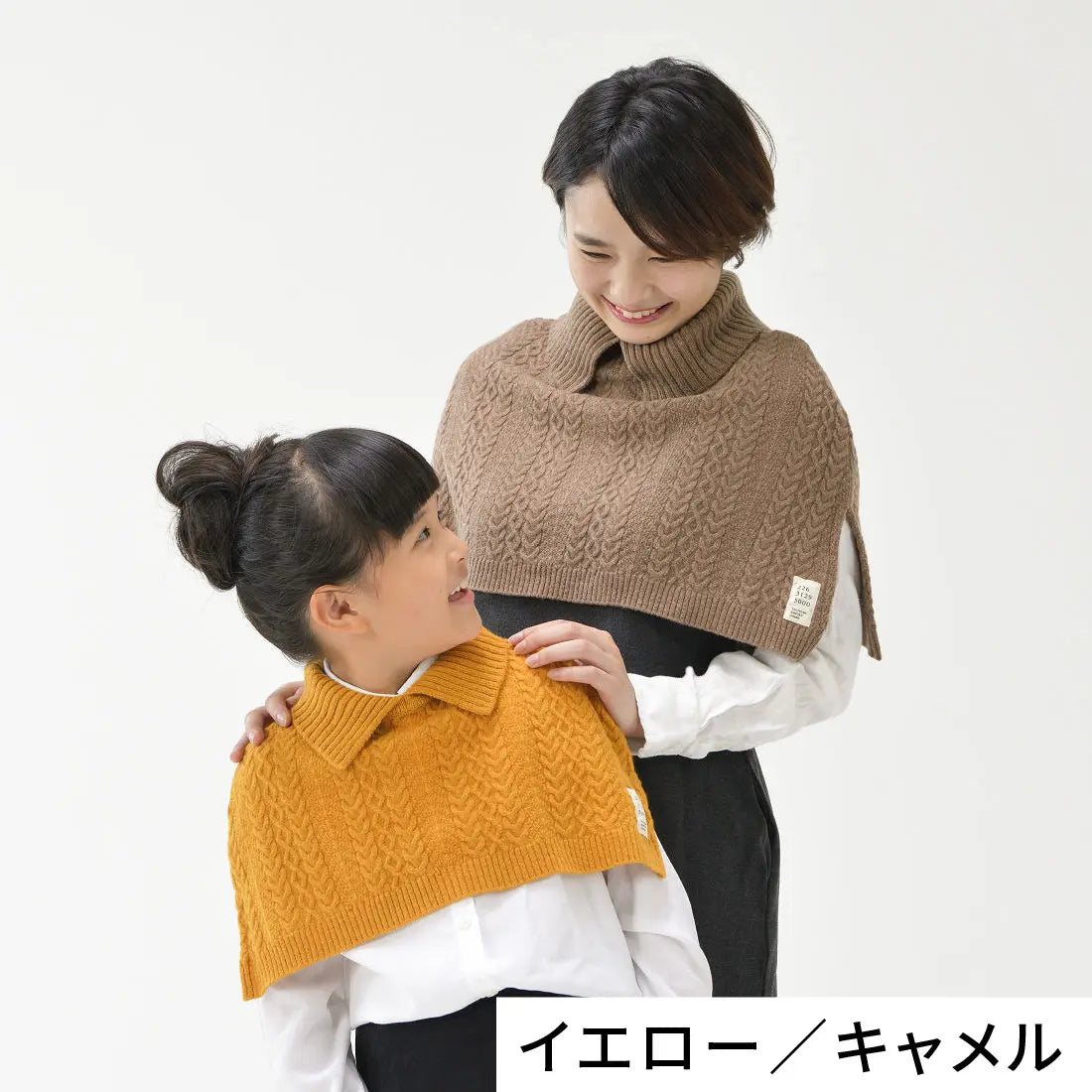 ケーブル編みケープ ウール100%